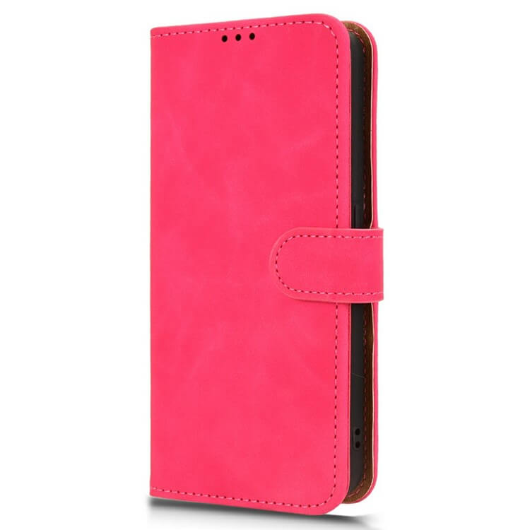 Die Cover-Discount CMF Phone 2 Pro - Solide Leder Etui Hülle ist eine leuchtend pinke Handyhülle mit Magnetverschluss und Kartenfach, die aufrecht auf einem weißen Hintergrund steht.