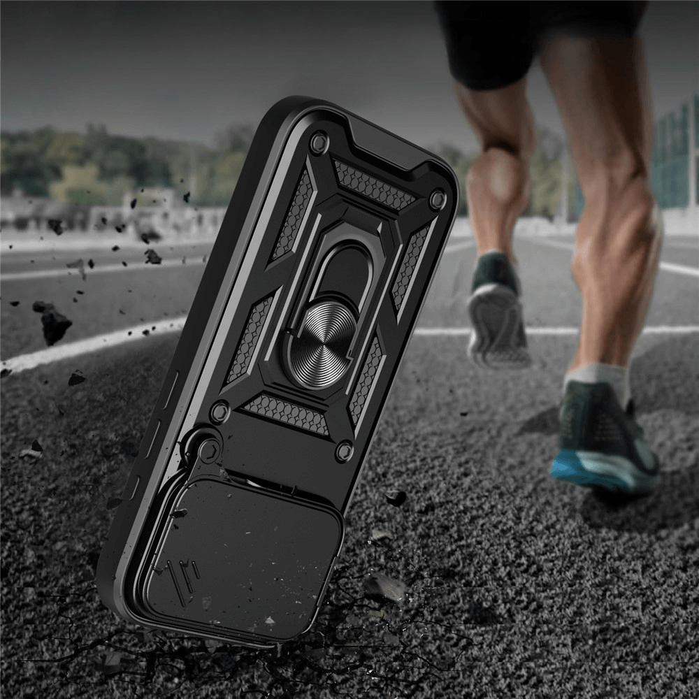 Das iPhone 17 Pro Max - Armor Case mit Kickstand von Cover-Discount in Schwarz liegt auf der Laufbahn, während im Hintergrund ein Läufer vorbeizieht.