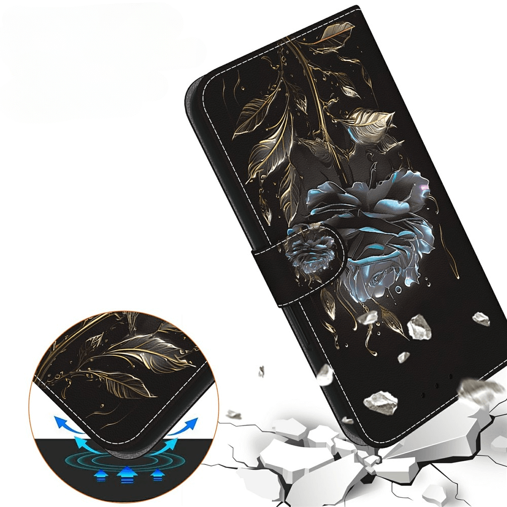 Schwarze florale iPhone 17 Tasche von Cover-Discount mit goldenen Blättern, einer blauen Blume und stoßfestem Design, das eine graue Oberfläche bricht - die ideale Blüten-Motiv Tasche Hülle für Stil und Schutz.