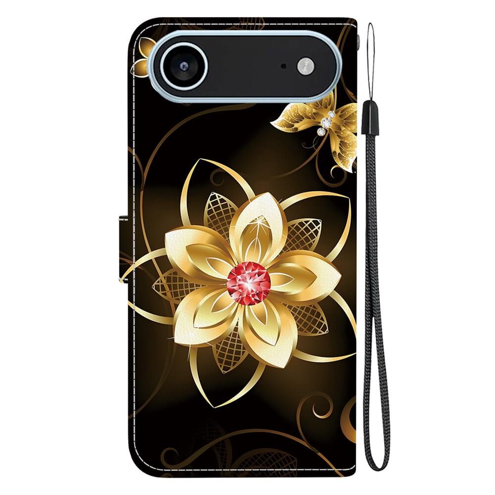 Die Cover-Discount iPhone 17 Air Handytasche Klapphülle Motiv zeigt ein goldenes Blumendesign mit einem roten Juwel in der Mitte auf Schwarz und enthält eine Handschlaufe. Kompatibel mit dem iPhone 17; stilvoller und praktischer Schutz.