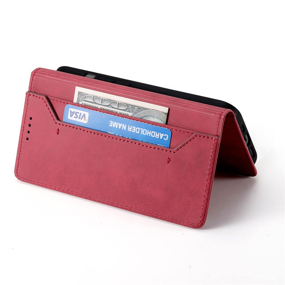 Die rote Flip Case mit RFID Blocker von Cover-Discount hält Karten und Bargeld, dient als Ständer für das schwarze iPhone 17 Air auf weißem Hintergrund.