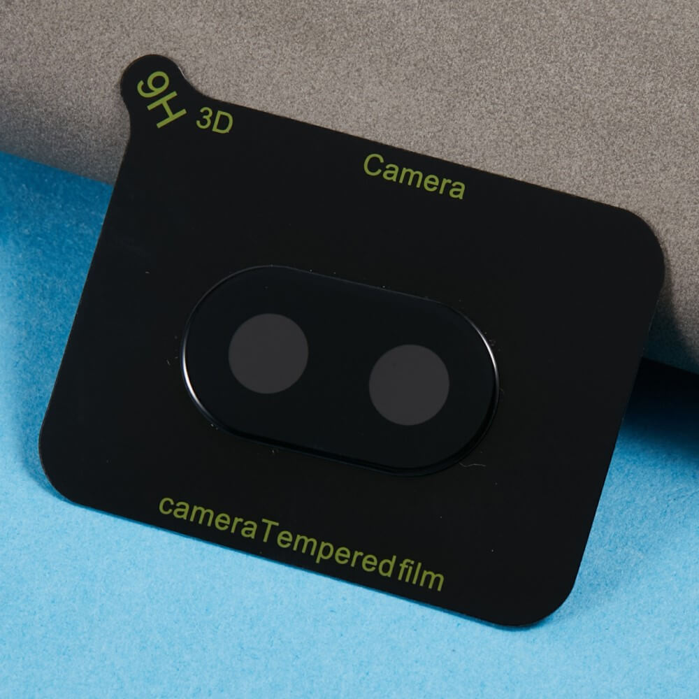 Cover-Discount Google Pixel 9a – 2 Stk. Panzerglas Kamera-Objektivschutz, beschriftet mit 9H 3D, in Schwarz, auf blau-grauem Untergrund dargestellt.