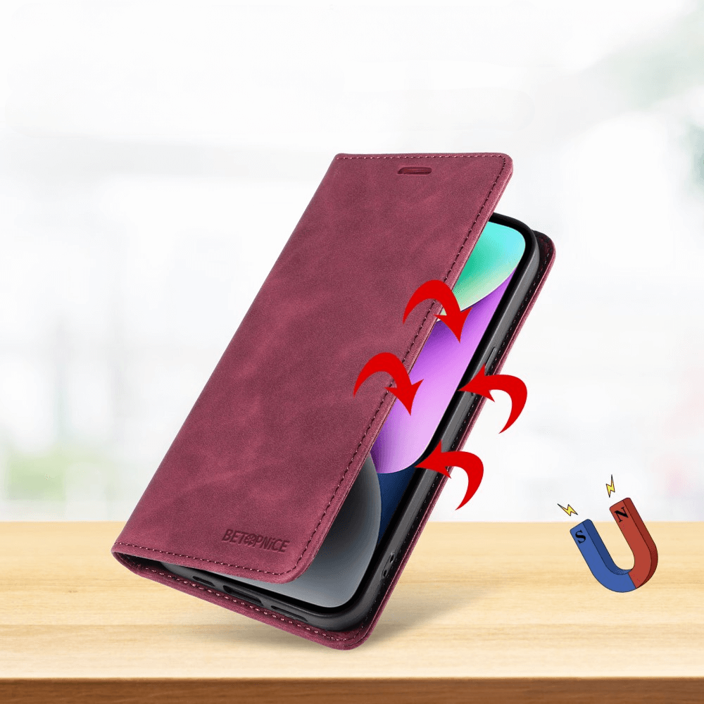 Das Sony Xperia 1 VII – Vintage Flip Case von Cover-Discount in Kastanienbraun verfügt über einen Magnetverschluss und eine Brieftaschenfunktion, hervorgehoben durch rote Pfeile und ein Magnetsymbol auf einer Holzoberfläche.