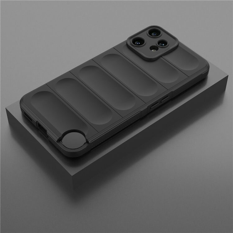 Ein schwarzes Smartphone mit der Cover-Discount CMF Phone 2 Pro - Rugged Protective Hülle ruht auf einer grauen rechteckigen Oberfläche, die maximalen Schutz bietet.