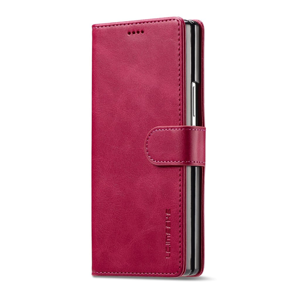 Eine rosafarbene LC.IMEEKE Galaxy Z Fold7 Leder Etui Hülle Handytasche mit Magnetverschluss, aufrecht stehend und teilweise geöffnet.