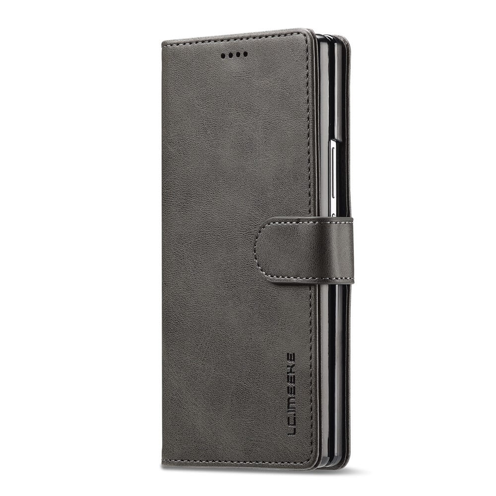 Die LC.IMEEKE Leder Etui Hülle für Galaxy Z Fold7 ist eine graue Kunstleder-Smartphone-Hülle mit Magnetverschluss und Standfunktion, die Stil und Funktionalität vereint.
