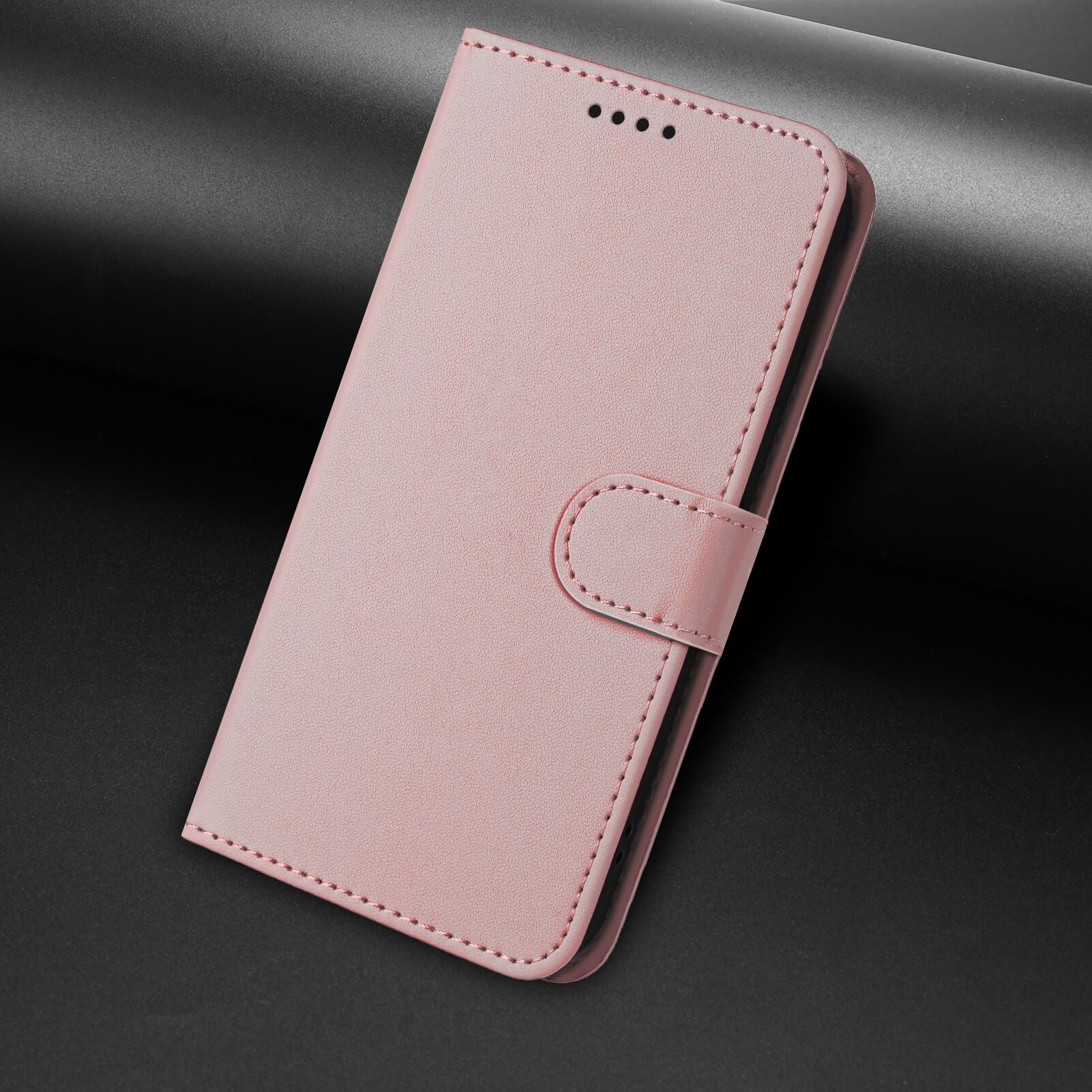 Cover-Discount iPhone 17 Air - Elegante Ledertasche in Hellrosa: Elegante Ledertasche mit Kartenfächern und Magnetverschluss auf schwarzem Hintergrund.