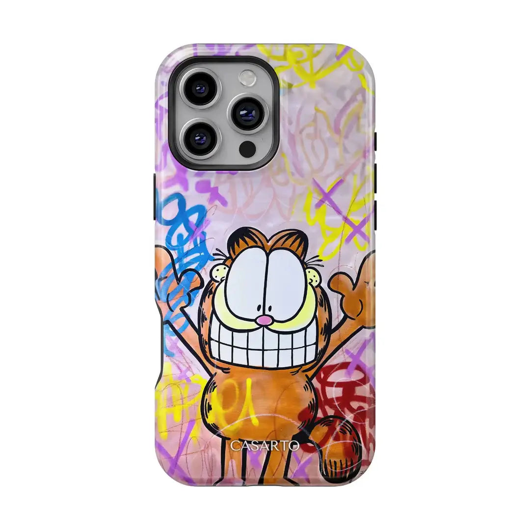 Casarto iPhone 16 Pro - Casarto Handyhülle Happy Day: Limited Edition Hülle mit Cartoon-Katze, großen Augen und breitem Grinsen auf buntem Graffiti-Hintergrund-MagSafe-kompatibel für kabelloses Laden.